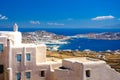 Mykonos port with boats and windmills at evening, Cyclades islands. Royalty Free Stock Photo