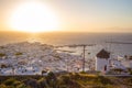 Mykonos town with windmill at sunset, Greece Royalty Free Stock Photo