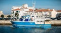 Myosotis fishing boat that enters the harbor in return for fishing Royalty Free Stock Photo