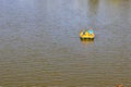 People riding pedalo boat on Khorol river in Myrhorod, Ukraine