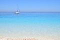 Myrthos Beach, crystal clear waters and the ship with sails Royalty Free Stock Photo