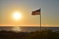 Myrtle beach ocean american flag sunset sunrise Royalty Free Stock Photo