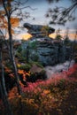 Mysterious ancient rocks in the beautiful autumn forest. Stone town, Perm region, Russia