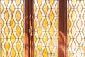mysterious ancient yellow-white stained glass window Royalty Free Stock Photo