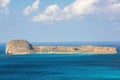 Mysterious Balos bay, island Crete, Greece. In the azure sea there are mountains edged with the water. Sky with clouds. Waves. Royalty Free Stock Photo