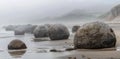 The mysterious beach, spherical stones along a beach, shrouded in mist created with Generative AI technology