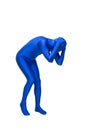 Mysterious blue man in costume holds head