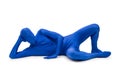 Mysterious blue man in morphsuit lying on the floor