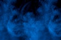 Mysterious blue patterns mystical cigarette vapor ghostly and misty fluffy and charming