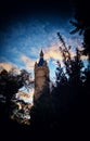 Mysterious castle between dark clouds