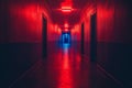 Mysterious corridor illuminated by red lights and a blue exit at the end in a dimly lit building Royalty Free Stock Photo