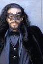 Mysterious elegant long haired man in masquerade