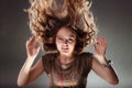 Mysterious enigmatic woman girl with flying hair. Royalty Free Stock Photo