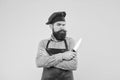 Mysterious face handsome bearded cook hold sharp professional knife