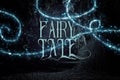 mysterious fairy tale background of dark and haunted forest and magical lights with text. Royalty Free Stock Photo