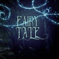 mysterious fairy tale background of dark and haunted forest and magical lights with text. Royalty Free Stock Photo