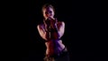 mysterious female figure in oriental style, performing exotic belly dance, moving slowly