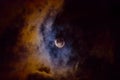 Mysterious full moon on a cloudy night. Arizona. Royalty Free Stock Photo