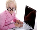 Mysterious Girl Typing on her Laptop in Secrecy Royalty Free Stock Photo