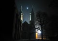 Mysterious gothic cathedral in Plock Poland at night by the moonlight. Cathedral of the Blessed Virgin Mary of Masovia, in Plock.