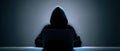 The mysterious hacker intently working on a laptop in a dark setting. AI generated image Royalty Free Stock Photo