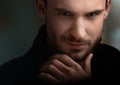 Mysterious handsome man with sneaky look Royalty Free Stock Photo