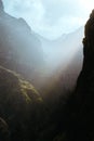 Mysterious light rays on the slopes of the rocks in huge canyon on Santo Antao island, Cape Verde, Cabo Verde