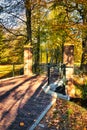 Mysterious long shadows and gates to historic mansion Royalty Free Stock Photo