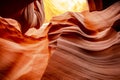 Mysterious Lower Antelope Canyon in Page Arizona with natural landscapes of bright sandstones stacked in flaky fire waves in a