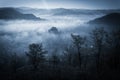 Mysterious misty morning over Biertan village, Transylvania, Romania. Royalty Free Stock Photo