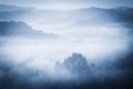 Mysterious misty morning over Biertan village, Transylvania, Romania.