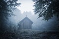 Mysterious misty morning over Biertan village, Transylvania, Romania. Royalty Free Stock Photo