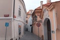 Mysterious narrow alley with lanterns in Prague.