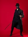 A mysterious ninja assassin in a noir style. A man in black leather clothes Royalty Free Stock Photo