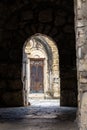 Mysterious old stone archway leading to the entrance of the Motsameta monastery in Imereti, Georgia Royalty Free Stock Photo