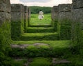 Mysterious path through ancient stone ruins