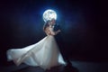 Mysterious and romantic meeting, the bride and groom under the moon. Hugs together. Mixed media Royalty Free Stock Photo