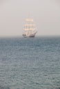 Mysterious sailing ship surrounded fog Royalty Free Stock Photo