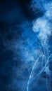 Mysterious silhouette of a human body sculpted by smoke on a dark and atmospheric background Royalty Free Stock Photo