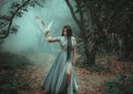 Mysterious sorceress with a bird Royalty Free Stock Photo