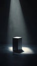 Mysterious Spotlight on a Dark Cube in a Dramatic Minimalist Setting with Shadows and Light Royalty Free Stock Photo