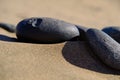 The mysterious story of two pebbles in the sand of Gran Canaria