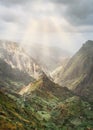Mysterious sunrays shining on mountain peaks in Xo-Xo valley of Santa Antao island in Cape Verde Royalty Free Stock Photo