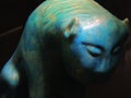 Mysterious turquoise feline sculpture