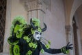 Mysterious mask with black horns in Venice, Carnival