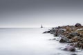 Mysterious water and rocky shore