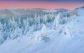 Mysterious winter landscape majestic mountains in . Magical snow covered tree. In anticipation of the holiday. Dramatic Royalty Free Stock Photo