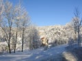 Mysterious winter landscape majestic mountains in winter. Magical winter snow covered tree. Winter road in the mountains. In antic Royalty Free Stock Photo