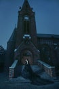 Mysterious woman in black dress near chirch Royalty Free Stock Photo