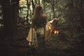 Mysterious woman in fairy forest Royalty Free Stock Photo